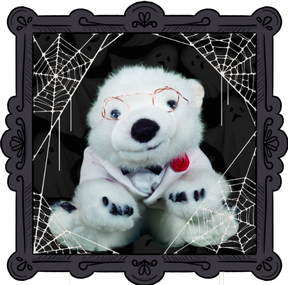 Vanilla, a polar bear, sitting in a frame 