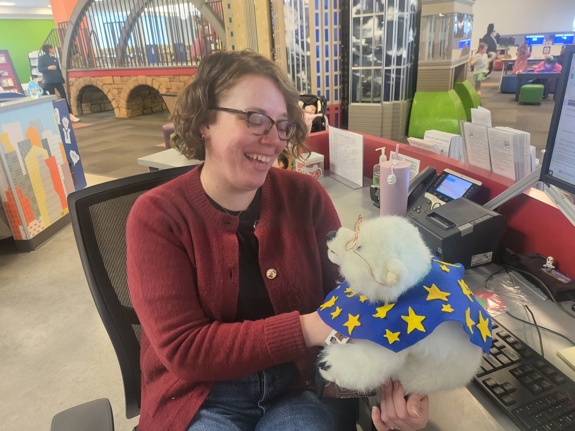 Nikki holding Vanilla and smiling 