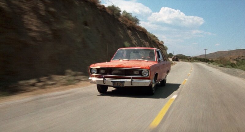 Dennis Weaver chased by a truck