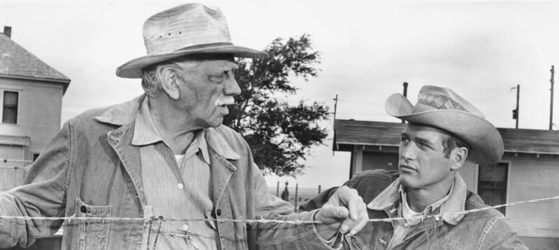 Paul Newman and Melvyn Douglas in cowboy mode