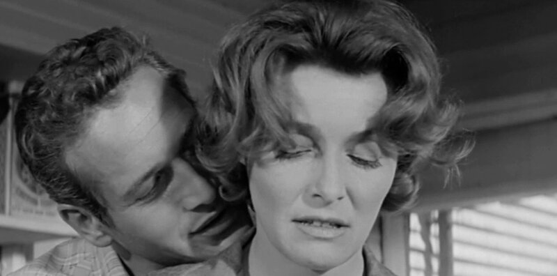 Paul Newman and Patricia Neal in an awkward moment