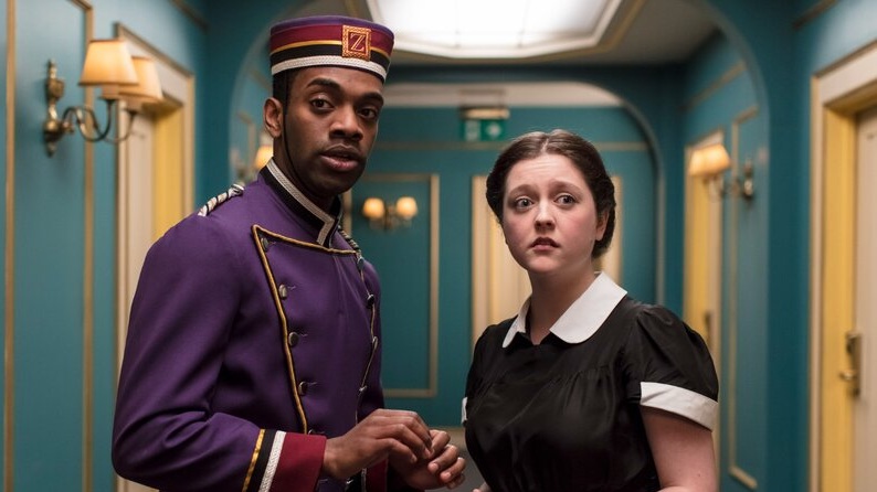 Man and woman in a hallway