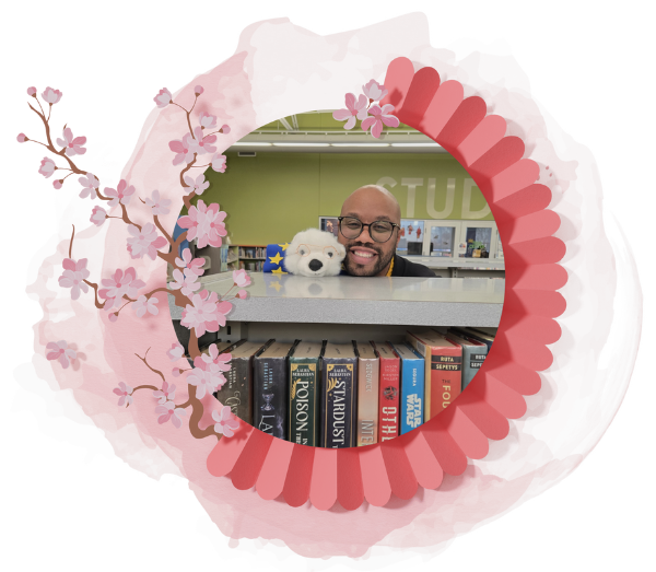 Vanilla and Jamal with chins on bookshelf