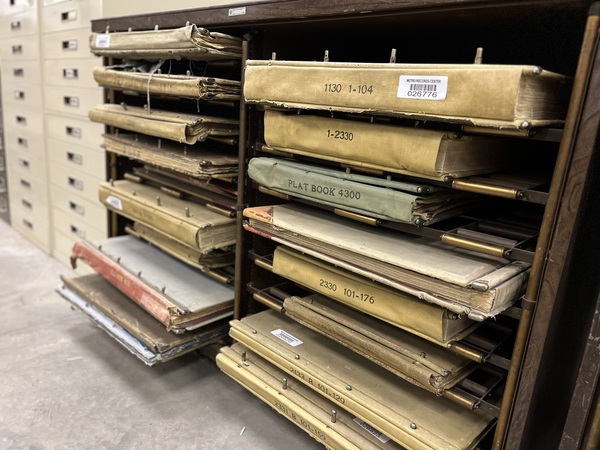 Photo of plat books at our storage facility