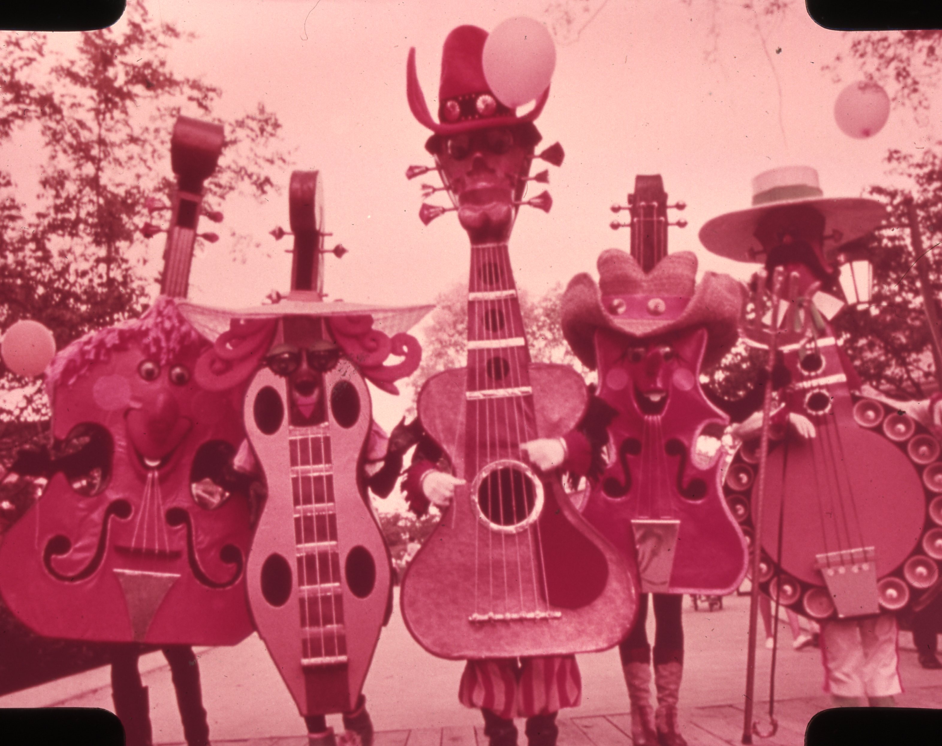 Photos of the mascot musical characters at Opryland