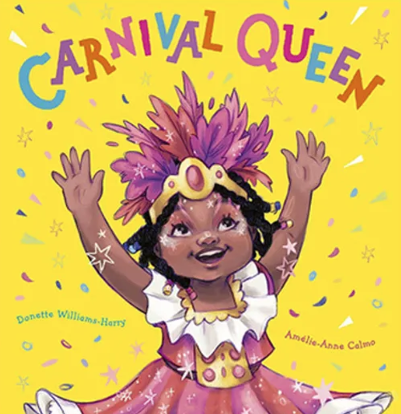 Little girl smiling in her Carnival outfit.