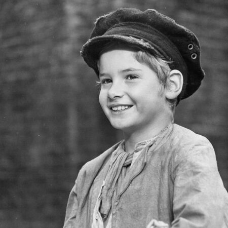 Mark Lester as the titular character
