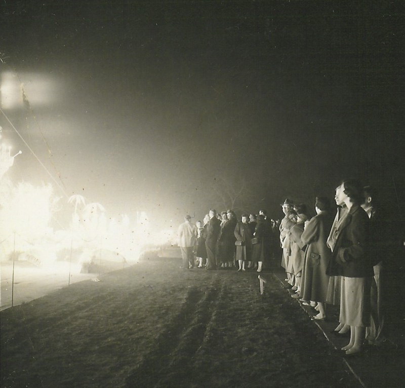 Onlookers enjoying the Nativity Scene at Centennial Park