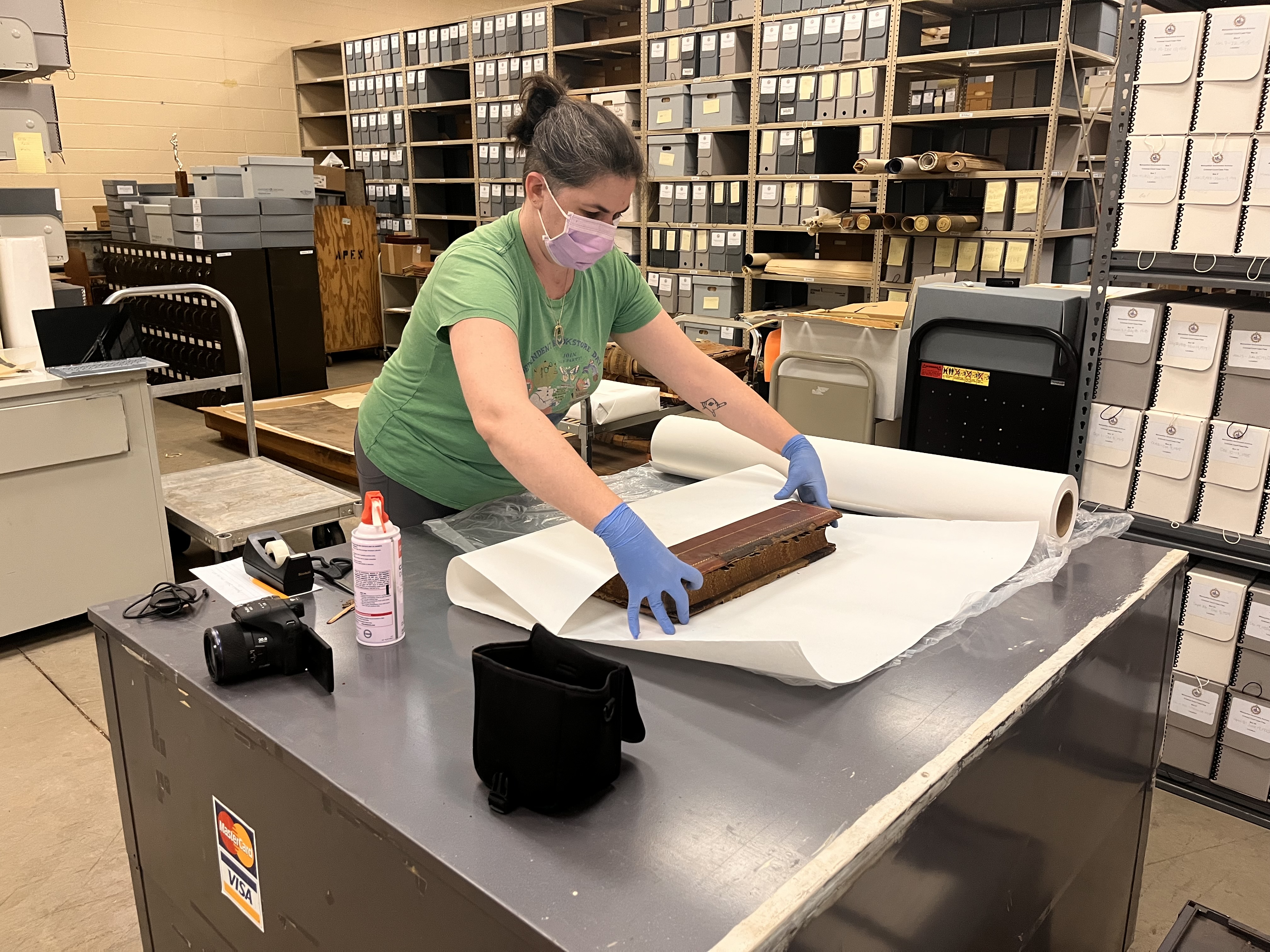 Grace is working on wrapping deteriorating Guardian Settlement books