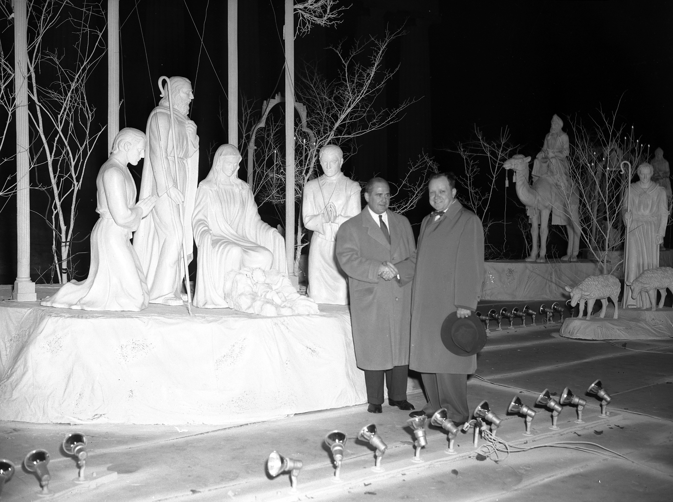 Ben West shaking hands with Fred Harvey at the Nativity Scene