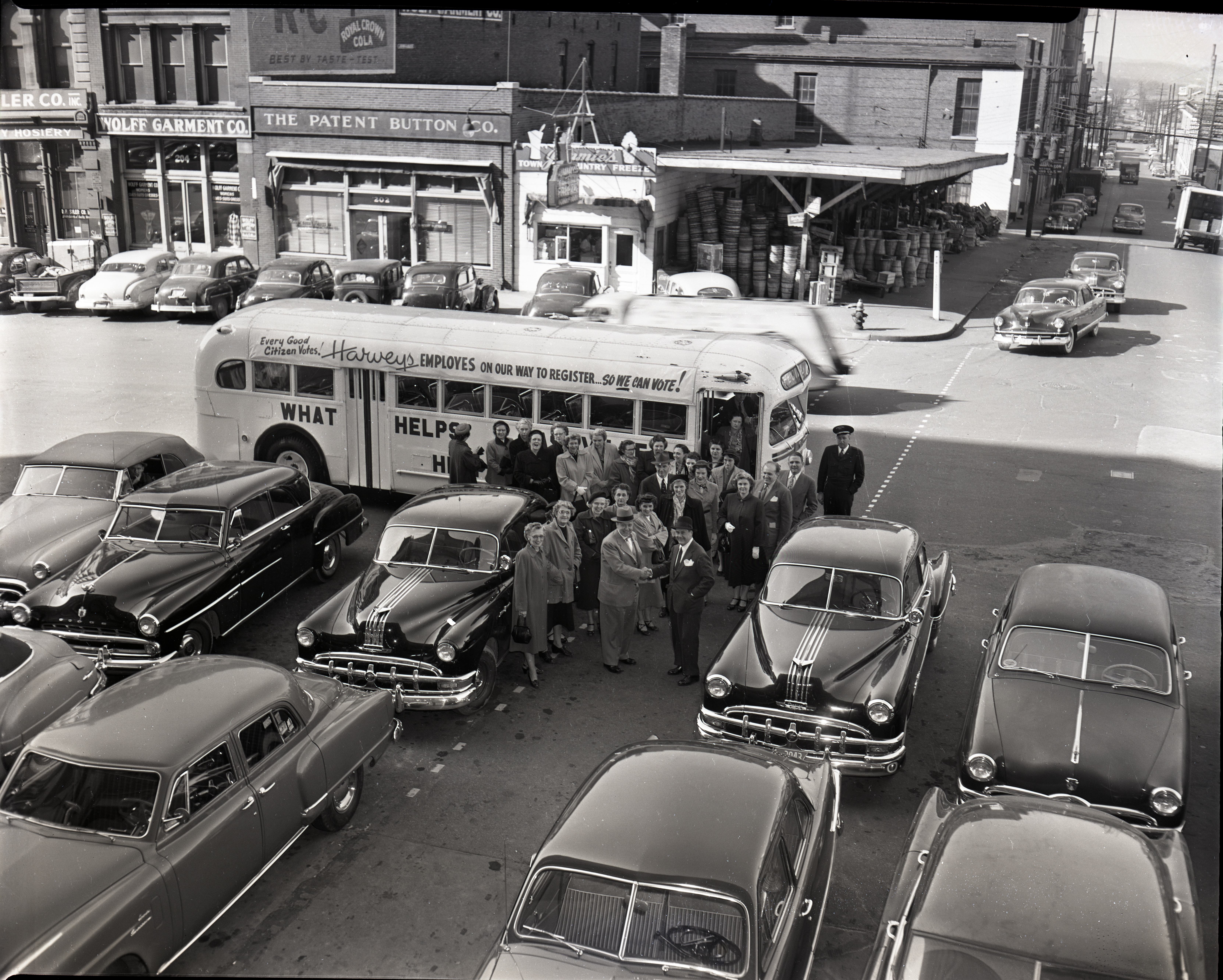 Fred Harvey with Mayor Ben West and the Harvey's staff as they visit the courthouse to register to vote