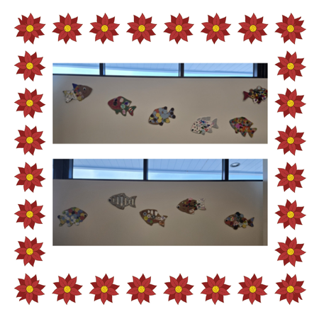 Cardboard fish on wall