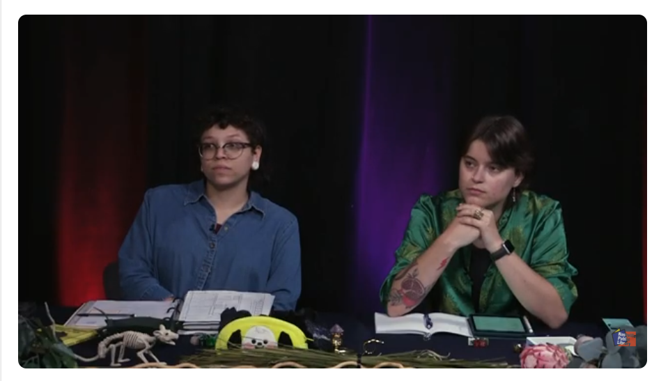 Haylee Blystone [left] and Hannah Gerst [right] playing Dungeons and Dragons for Overdue Adventures 