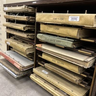 Photo of plat books at our storage facility