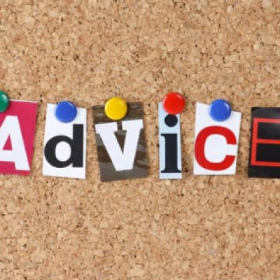 The word 'advice' spelled out with individual letters cut out from magazines