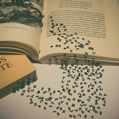 book with words coming off page