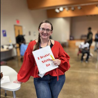 Shandi overseeing haircut program at Pruitt Branch Library