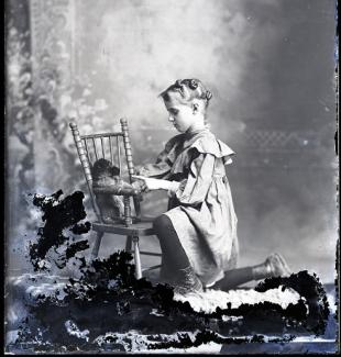Hicks Green glass plate negative, girl with puppy