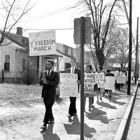 Black and white photo of students marching during the Freedom March on Jefferson Street, Nashville, Tennessee, 1963 March 23