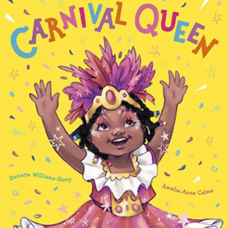 Little girl smiling in her Carnival outfit.