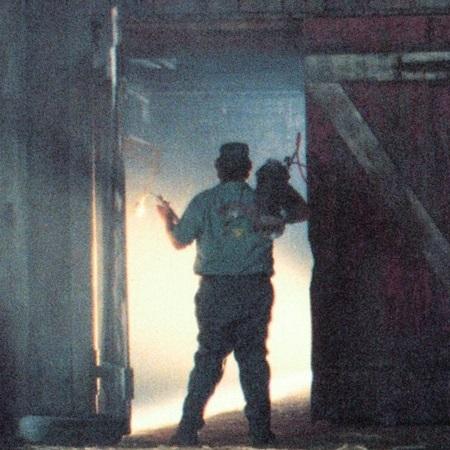 John Goodman in a barn