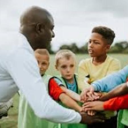 A coach with players